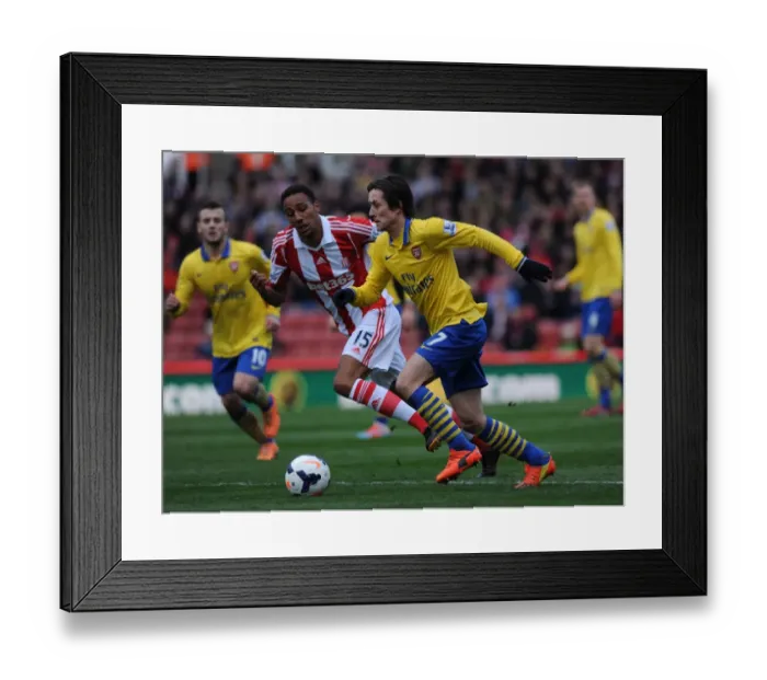 Framed Print : Tomas Rosicky's Pivotal Outmaneuver of Steven Nzonzi: A Game-Changing Moment in the Stoke City vs. Arsenal Premier League Clash (2013-14) Framed Print : Tomas Rosicky's Pivotal Outmaneuver of Steven Nzonzi: A Game-Changing Moment in the Stoke City vs. Arsenal Premier League Clash (2013-14)