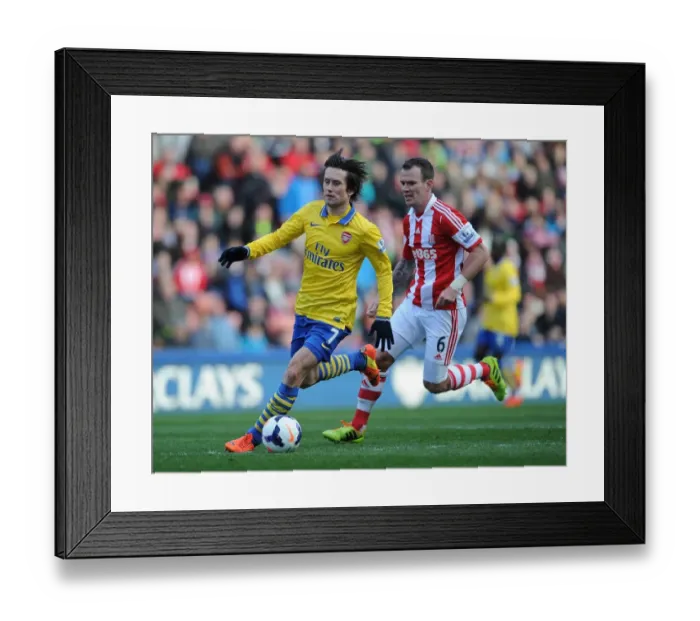 Framed Print : Tomas Rosicky Outmaneuvers Glenn Whelan: A Moment from the Stoke City vs. Arsenal Premier League Clash (2013-14) Framed Print : Tomas Rosicky Outmaneuvers Glenn Whelan: A Moment from the Stoke City vs. Arsenal Premier League Clash (2013-14)