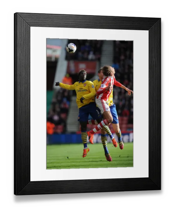 Framed Print : Bacary Sagna (Arsenal) Peter Crouch (Stoke). Stoke City 1: 0 Arsenal. Barclays Premier League Framed Print : Bacary Sagna (Arsenal) Peter Crouch (Stoke). Stoke City 1: 0 Arsenal. Barclays Premier League
