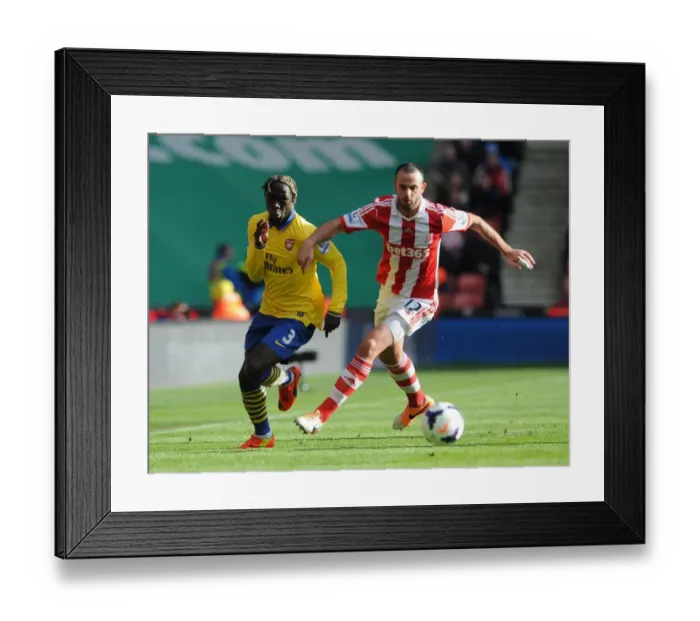 Framed Print : Battleground Britannia: Sagna vs Wilson - Stoke City vs Arsenal, Premier League 2013-14