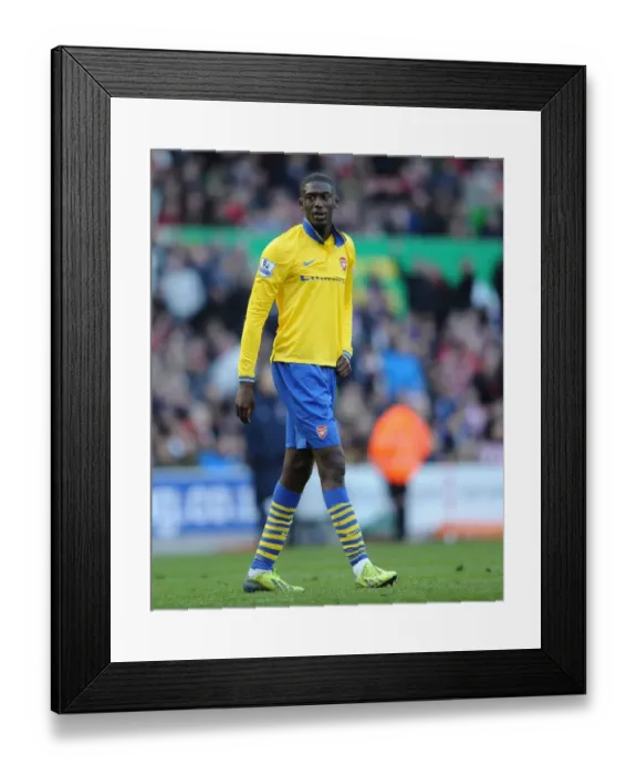 Framed Print : Yaya Sanogo in Action: Stoke City vs Arsenal, Premier League 2013-14