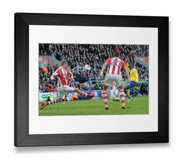 Framed Print : Yaya Sanogo (Arsenal) Ryan Shawcross (Stoke). Stoke City 1: 0 Arsenal. Barclays Premier League