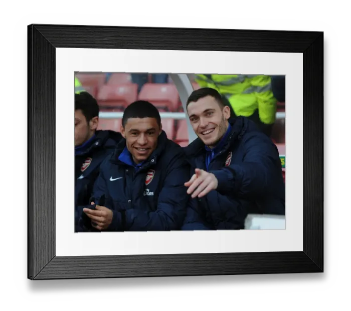 Framed Print : Arsenal Substitutes: Oxlade-Chamberlain and Vermaelen Prepare for Stoke City Showdown, 2014 Framed Print : Arsenal Substitutes: Oxlade-Chamberlain and Vermaelen Prepare for Stoke City Showdown, 2014