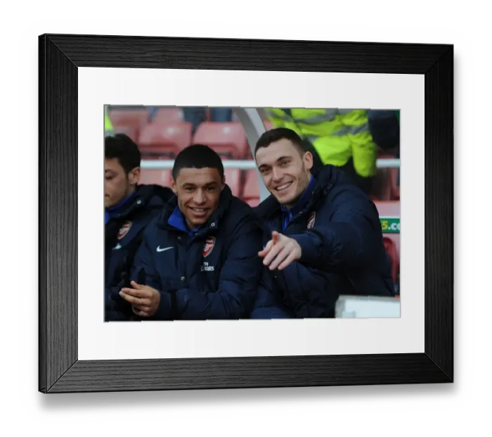 Framed Print : Arsenal Substitutes Oxlade-Chamberlain and Vermaelen Gear Up for Stoke City Battle Framed Print : Arsenal Substitutes Oxlade-Chamberlain and Vermaelen Gear Up for Stoke City Battle