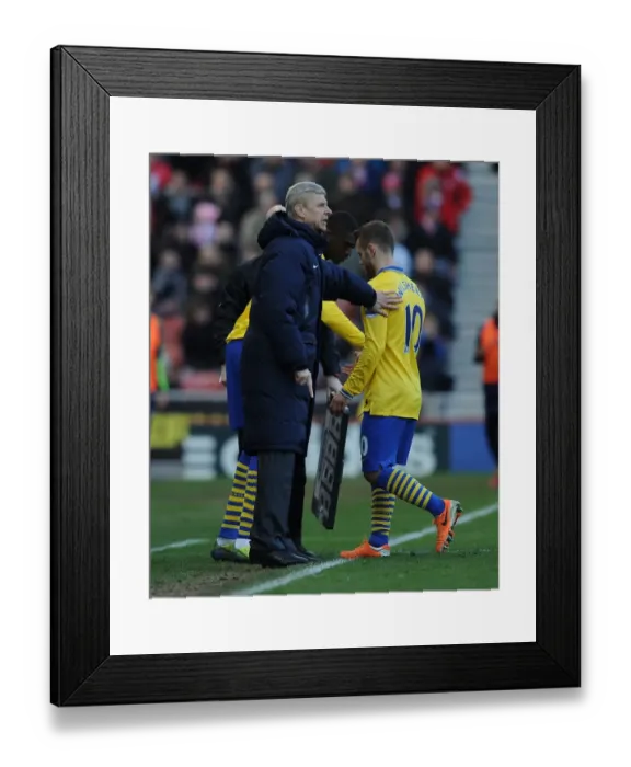 Framed Print : Arsene Wenger Consoles Substituted Jack Wilshere: Stoke City vs. Arsenal, Premier League 2013-14