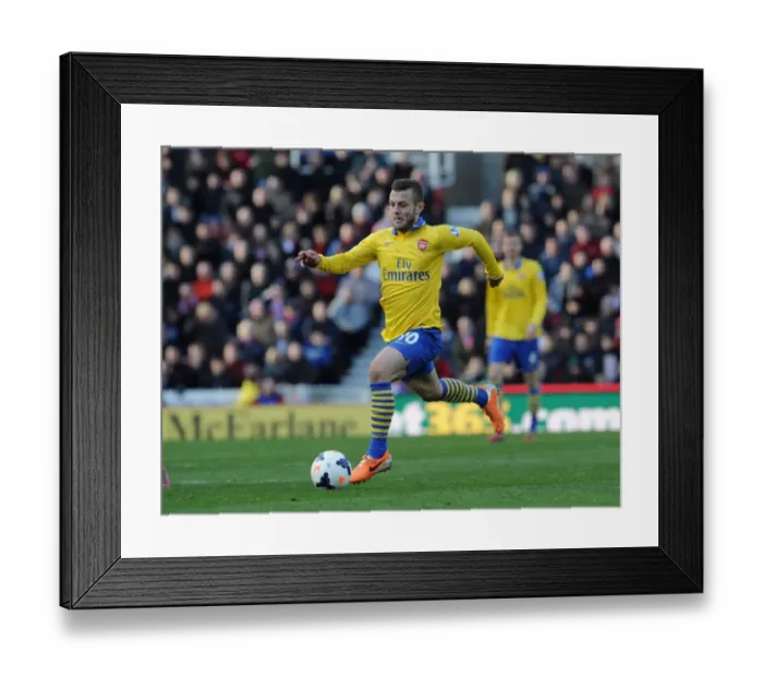 Framed Print : Jack Wilshere in Action: Stoke City vs Arsenal, Premier League 2013-14