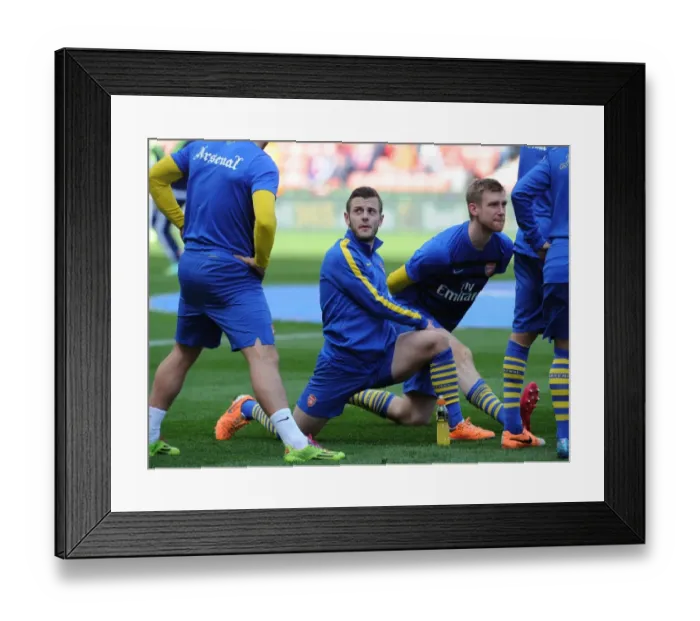 Framed Print : Jack Wilshere (Arsenal). Stoke City 1: 0 Arsenal. Barclays Premier League. The Britainna Stadium