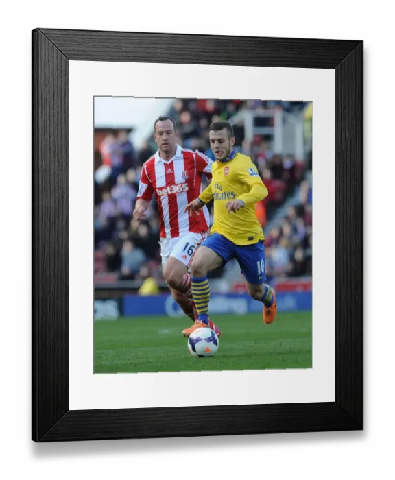 Framed Print : Jack Wilshere vs. Charlie Adam: Battle in the Midfield - Stoke City vs. Arsenal, Premier League 2013-14 Framed Print : Jack Wilshere vs. Charlie Adam: Battle in the Midfield - Stoke City vs. Arsenal, Premier League 2013-14