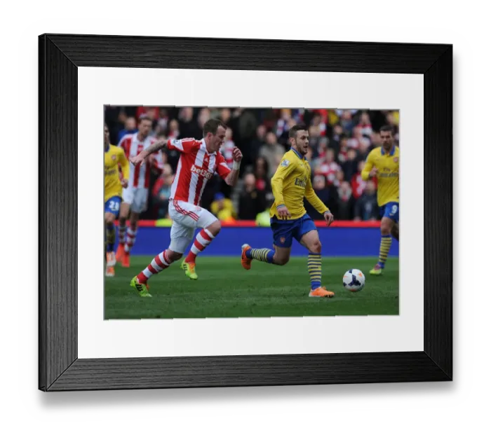 Framed Print : Jack Wilshere Surges Past Glenn Whelan: Stoke City vs. Arsenal, Premier League 2013-14