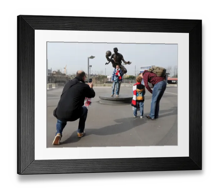 Framed Print : Arsenal FA Cup Quarter-Final: Fans Gather Around Dennis Bergkamp Statue