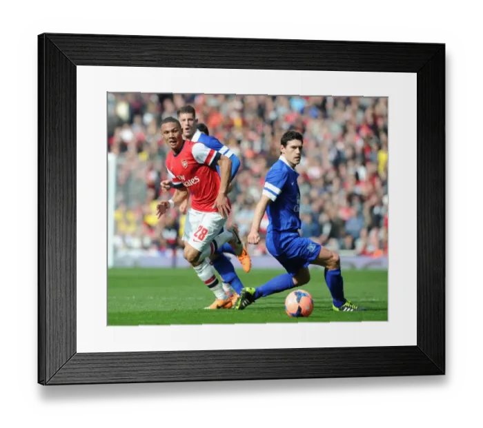 Framed Print : Arsenal's Kieran Gibbs Outmaneuvers Everton's Gareth Barry in FA Cup Quarter-Final Showdown Framed Print : Arsenal's Kieran Gibbs Outmaneuvers Everton's Gareth Barry in FA Cup Quarter-Final Showdown