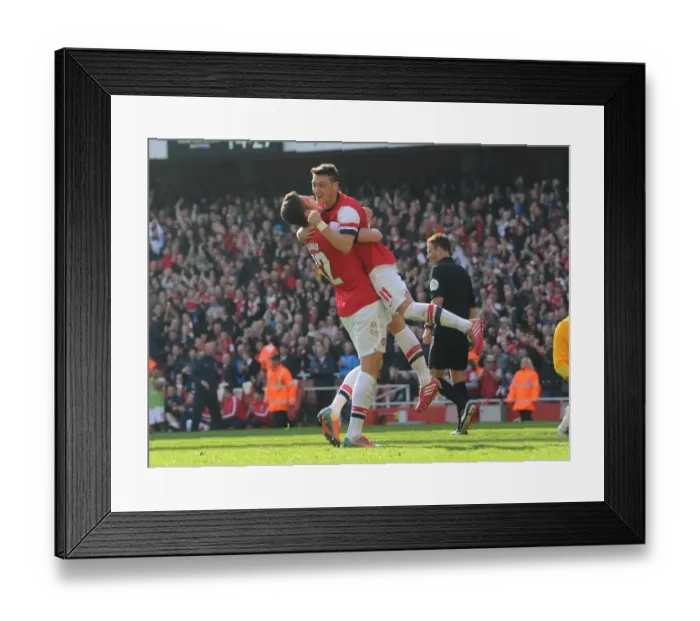 Framed Print : Arsenal's Giroud and Ozil: Celebrating Goals in FA Cup Victory over Everton (2014)