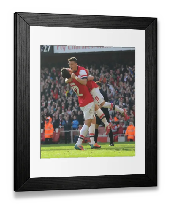 Framed Print : Arsenal's Unstoppable Duo: Olivier Giroud and Mesut Ozil's FA Cup Goal Celebrations vs Everton (2014)