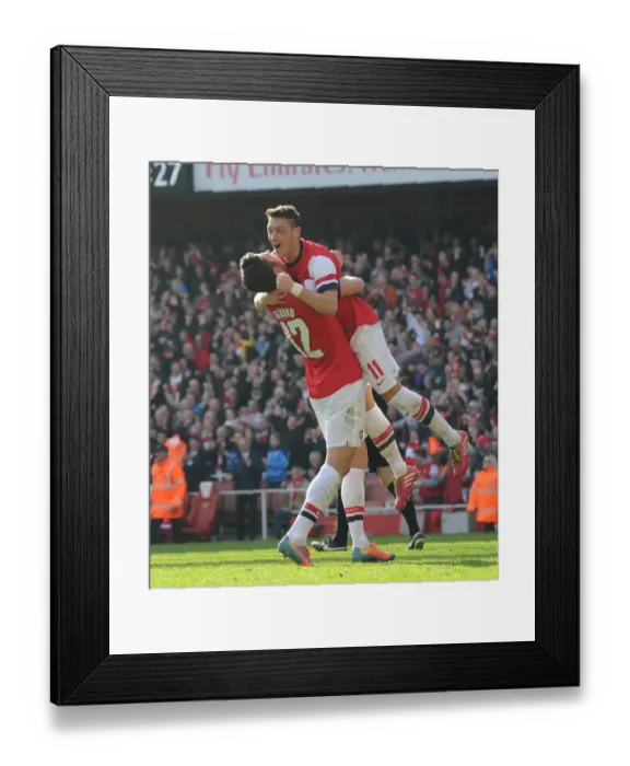 Framed Print : Giroud and Ozil's Thrilling Goal Celebrations: Arsenal's FA Cup Victory (2014)
