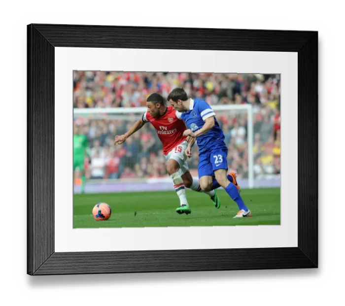 Framed Print : Clash of the Titans: Oxlade-Chamberlain vs. Coleman in FA Cup Quarter-Final (Arsenal vs. Everton - 2014) Framed Print : Clash of the Titans: Oxlade-Chamberlain vs. Coleman in FA Cup Quarter-Final (Arsenal vs. Everton - 2014)