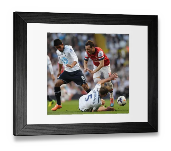 Framed Print : Santi Cazorla vs Jan Vertonghen: Intense Battle Between Arsenal and Tottenham