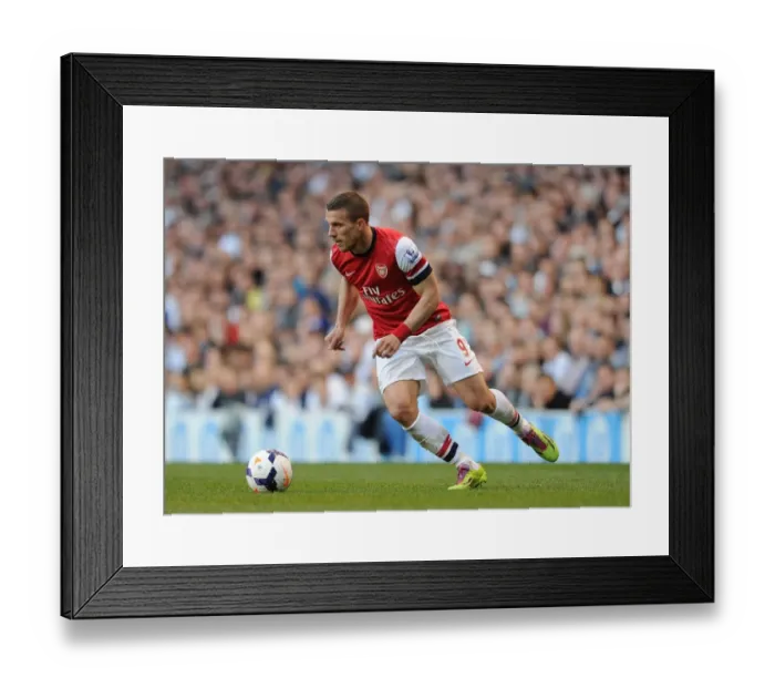 Framed Print : Lukas Podolski Faces Off: Tottenham Hotspur vs. Arsenal, Premier League 2013-14 Framed Print : Lukas Podolski Faces Off: Tottenham Hotspur vs. Arsenal, Premier League 2013-14