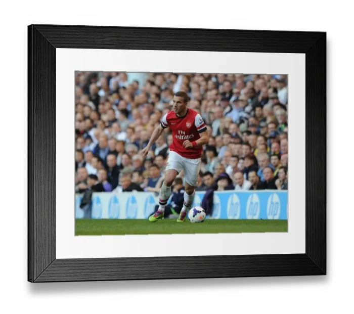 Framed Print : The Intense Rivalry: Lukas Podolski Faces Off in the Battle of North London - Tottenham Hotspur vs. Arsenal, Premier League 2013-14 Framed Print : The Intense Rivalry: Lukas Podolski Faces Off in the Battle of North London - Tottenham Hotspur vs. Arsenal, Premier League 2013-14