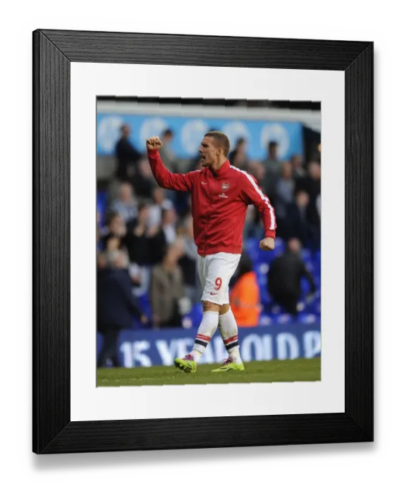 Framed Print : Lukas Podolski's Celebration: Arsenal's Victory Over Tottenham Hotspur in the Premier League, 2014 Framed Print : Lukas Podolski's Celebration: Arsenal's Victory Over Tottenham Hotspur in the Premier League, 2014