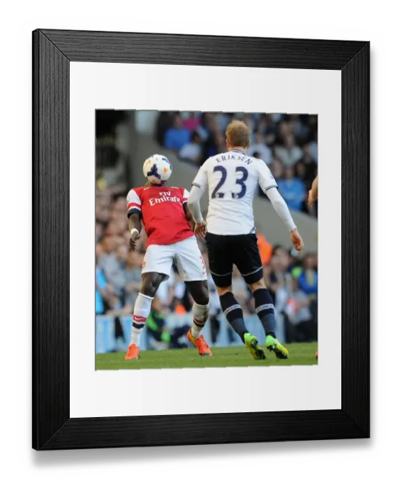 Framed Print : Battling for Control: Sagna vs. Eriksen in the Premier League Showdown