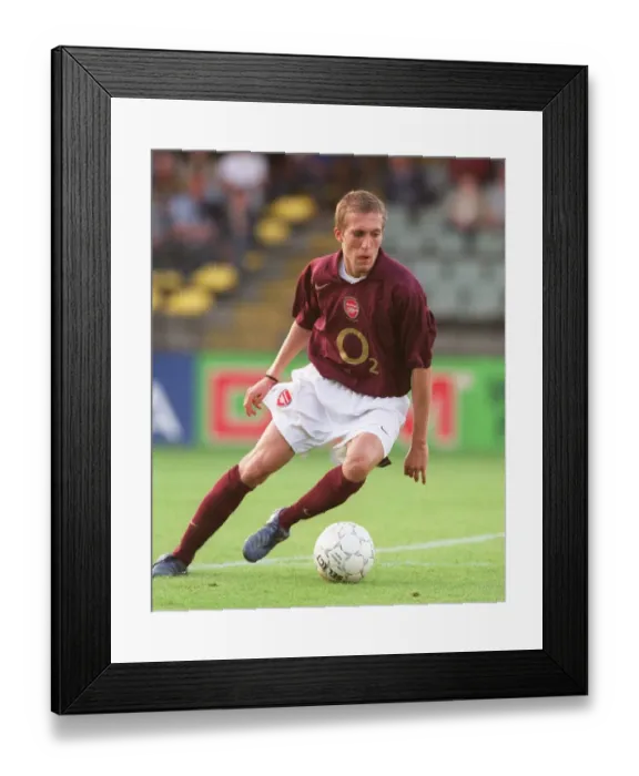 Framed Print : Thrilling 3-3 Showdown: Arsenal vs. Beveren, 2005 Pre-Season Friendly