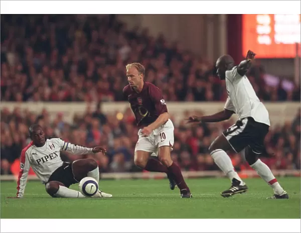 Dennis Bergkamp (Arsenal) Luis Boa Morte and Papa Bouba Dioup (Fulham)