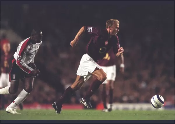 Dennis Bergkamp (Arsenal) Luis Boa Morte (Fulham). Arsenal 4: 1 Fulham