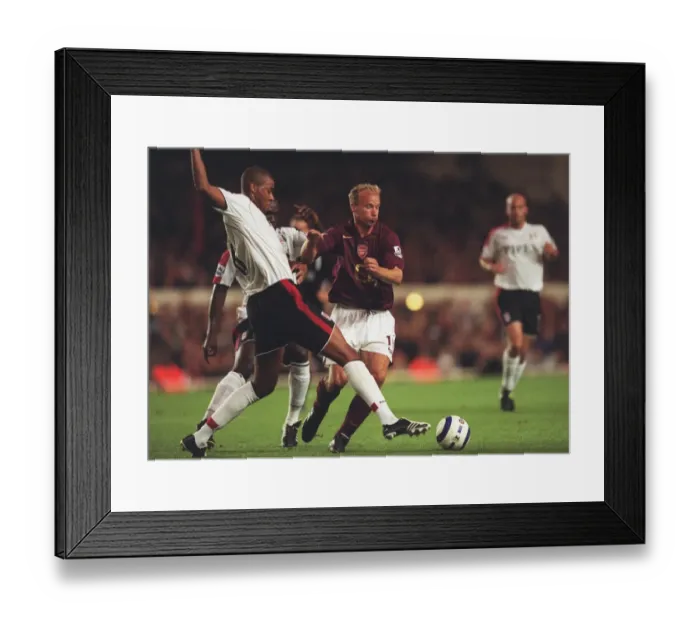 Framed Print : Dennis Bergkamp (Arsenal) Zat Knight (Fulham). Arsenal 4: 1 Fulham