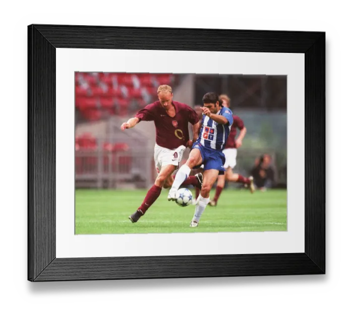 Framed Print : Dennis Bergkamp vs. Porto: Arsenal's Victory at The Amsterdam Tournament (2005) Framed Print : Dennis Bergkamp vs. Porto: Arsenal's Victory at The Amsterdam Tournament (2005)