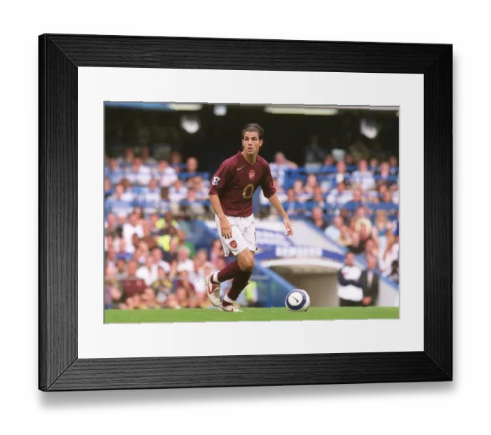 Framed Print : FA Premier League Showdown: Cesc Fabregas in Action for Arsenal vs. Chelsea at Stamford Bridge, 2005