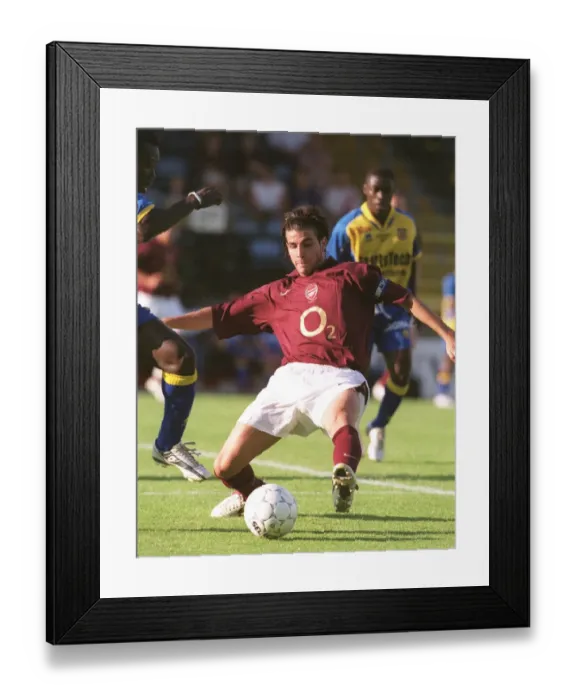 Framed Print : Cesc Fabregas in Action: Arsenal vs Beveren, 2005 Pre-Season Friendly Framed Print : Cesc Fabregas in Action: Arsenal vs Beveren, 2005 Pre-Season Friendly