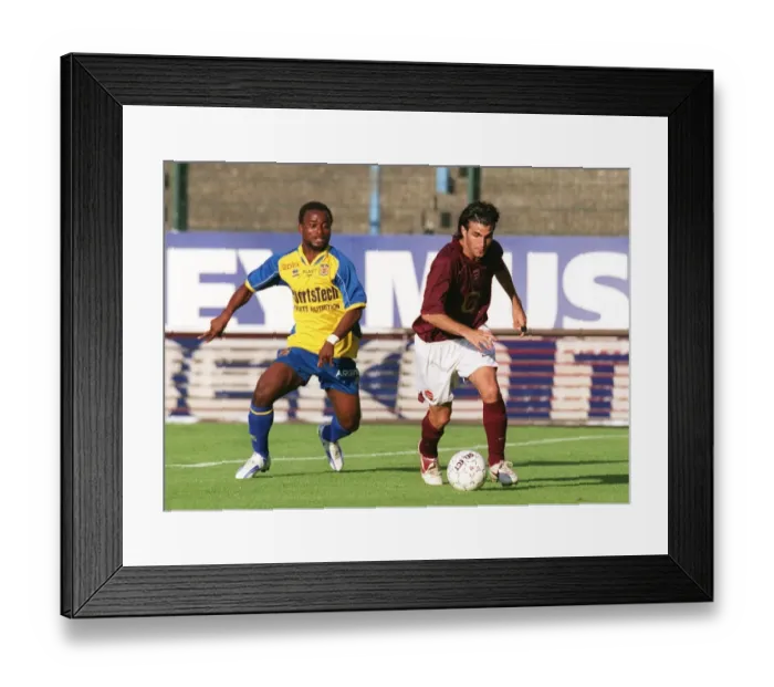 Framed Print : Cesc Fabregas (Arsenal) Kipre Constant (Beveren). Beveren 3: 3 Arsenal