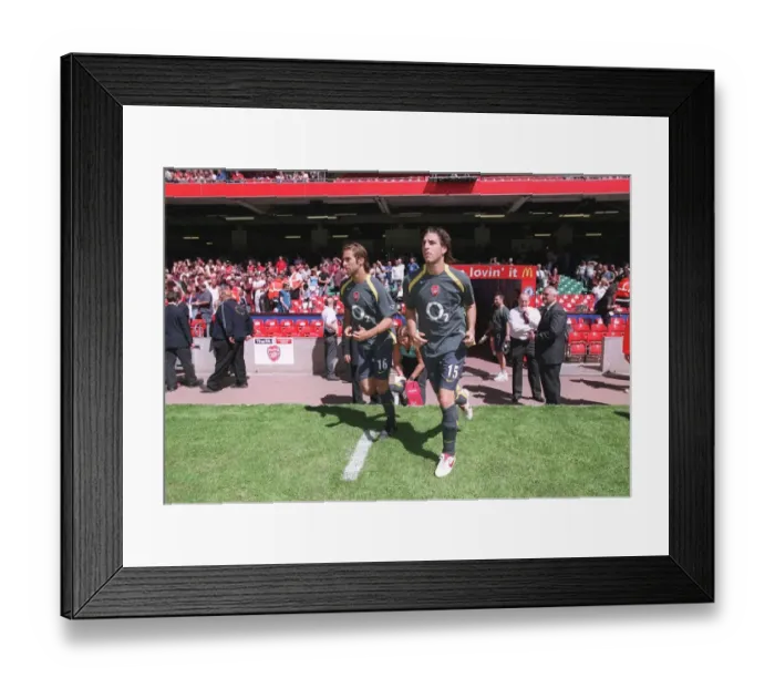 Framed Print : Cesc Fabregas and Mathieu Flamini (Arsenal) run out to warm up Framed Print : Cesc Fabregas and Mathieu Flamini (Arsenal) run out to warm up