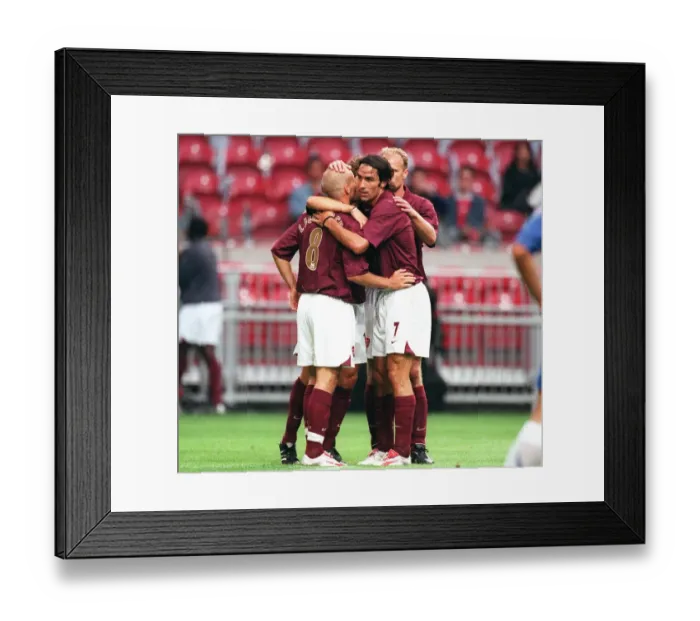 Framed Print : Freddie Ljungberg is congratulated on his 2nd goal. Arsenal 2: 1 Porto