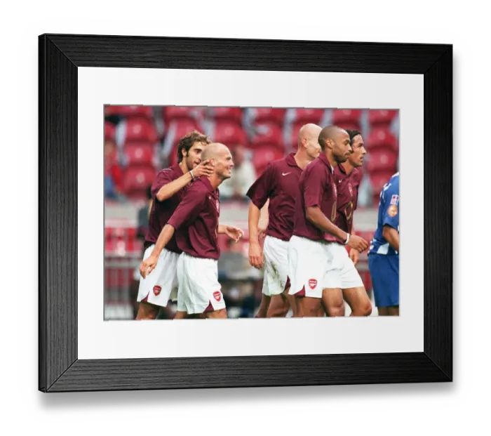Framed Print : Arsenal's Double Victory: Freddie Ljungberg Scores the Winning Goal against Porto at the Amsterdam Tournament Framed Print : Arsenal's Double Victory: Freddie Ljungberg Scores the Winning Goal against Porto at the Amsterdam Tournament