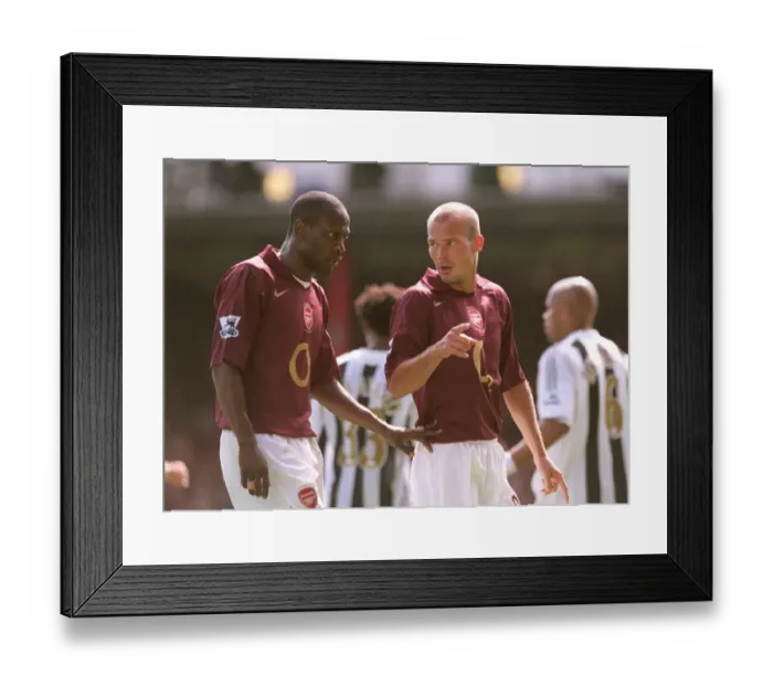 Framed Print : Glory Days at Highbury: Arsenal's Unforgettable 2-0 Victory Over Newcastle United (2005, Freddie Ljungberg and Lauren Celebrate) Framed Print : Glory Days at Highbury: Arsenal's Unforgettable 2-0 Victory Over Newcastle United (2005, Freddie Ljungberg and Lauren Celebrate)