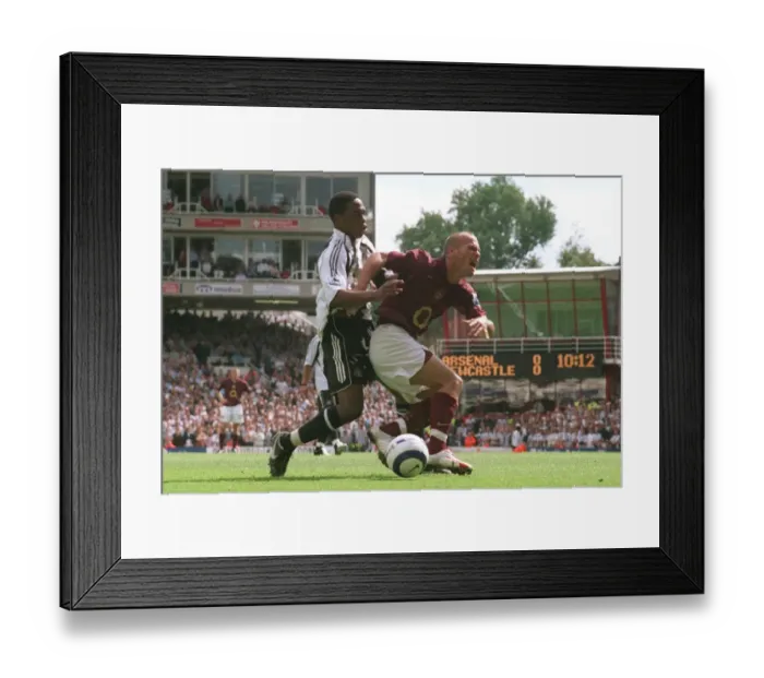Framed Print : Freddie Ljungberg (Arsenal) is fouled by Charles N Zogbia (Newcastle) in the penalty area Framed Print : Freddie Ljungberg (Arsenal) is fouled by Charles N Zogbia (Newcastle) in the penalty area