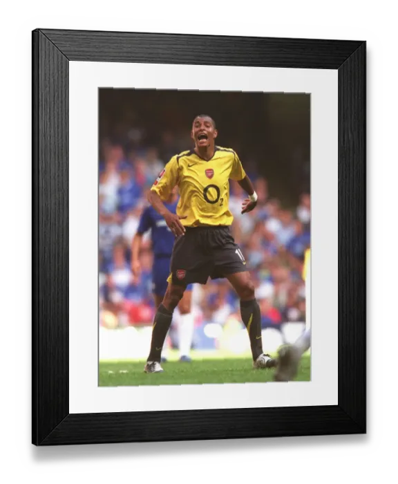 Framed Print : Gilberto's Determined Moment: Arsenal vs. Chelsea, FA Community Shield 2005 Framed Print : Gilberto's Determined Moment: Arsenal vs. Chelsea, FA Community Shield 2005