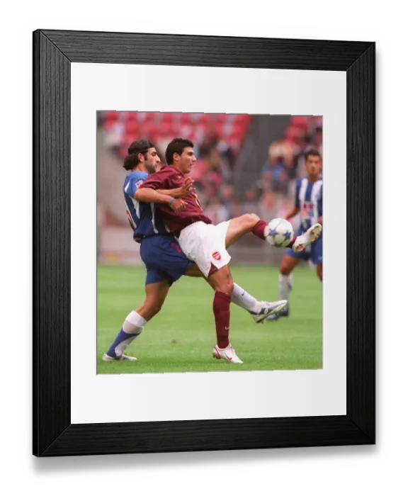 Framed Print : Jose Reyes (Arsenal) Faith Sonkaya (Porto). Arsenal 2: 1 Porto Framed Print : Jose Reyes (Arsenal) Faith Sonkaya (Porto). Arsenal 2: 1 Porto