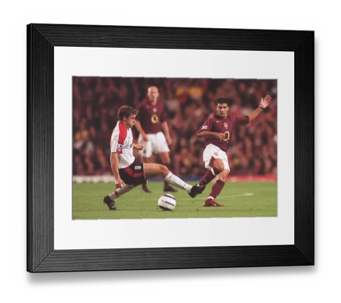 Framed Print : Jose Reyes (Arsenal) Mortiz Volz (Fulham). Arsenal 4: 1 Fulham