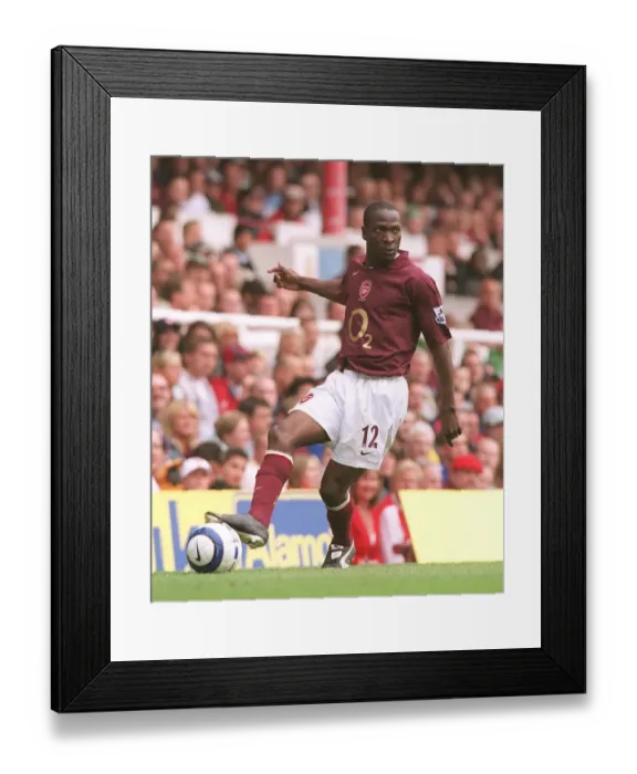 Framed Print : Arsenal's Lauren Celebrates 2-0 Win Over Newcastle United, FA Premier League, Highbury, London, 2005 Framed Print : Arsenal's Lauren Celebrates 2-0 Win Over Newcastle United, FA Premier League, Highbury, London, 2005