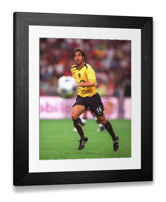 Framed Print : Flamini's Winning Goal: Arsenal Triumphs Over Ajax in Amsterdam Tournament