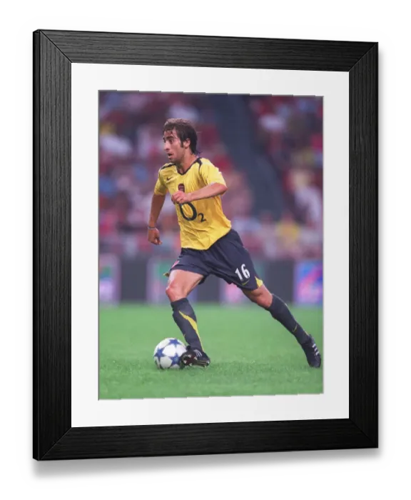 Framed Print : Arsenal's Unforgettable Victory: Flamini's Goal in the Amsterdam Tournament, 2005 Framed Print : Arsenal's Unforgettable Victory: Flamini's Goal in the Amsterdam Tournament, 2005