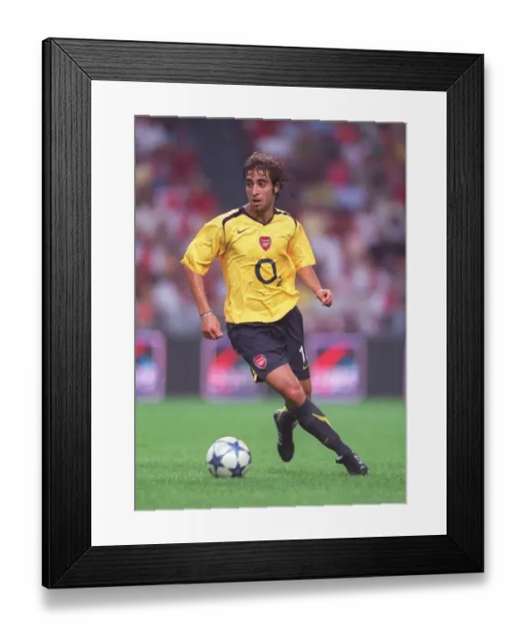 Framed Print : Unforgettable Victory: Flamini's Goal - Arsenal's Triumph at the Amsterdam Tournament (2005)