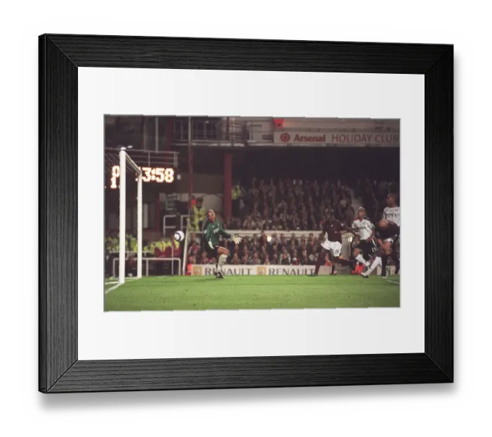 Framed Print : Pascal Cygan scores his and Arsenals 1st goal. Arsenal 4: 1 Fulham