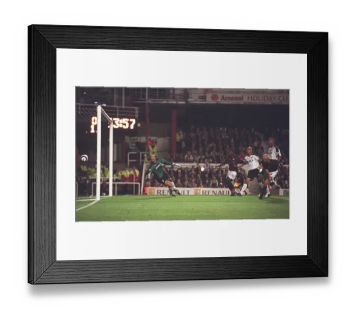 Framed Print : Pascal Cygan's Stunner: Arsenal's Opening Goal in Unforgettable 4-1 Victory over Fulham (August 24, 2005, Highbury, London) Framed Print : Pascal Cygan's Stunner: Arsenal's Opening Goal in Unforgettable 4-1 Victory over Fulham (August 24, 2005, Highbury, London)
