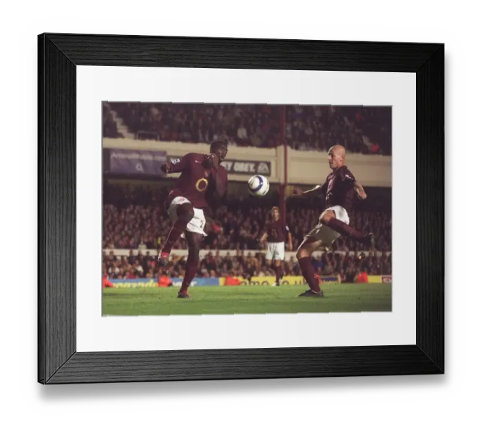 Framed Print : Pascal Cygan scores his 2nd and Arsenals 4th goal past Kolo Toure Framed Print : Pascal Cygan scores his 2nd and Arsenals 4th goal past Kolo Toure