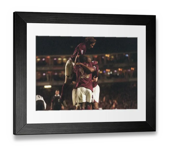 Framed Print : Arsenal's 4:1 FA Premier League Victory Over Fulham (Cygan's Brace)