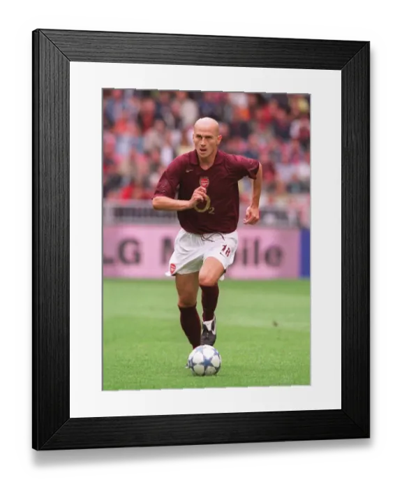 Framed Print : Pascal Cygan's Game-Winning Goal: Arsenal's Triumph at the 2005 Amsterdam Tournament vs. Porto, Amsterdam Arena