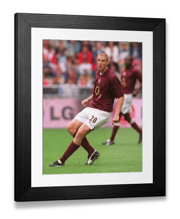 Framed Print : Philippe Senderos Celebrates Arsenal's Win Against Porto at the Amsterdam Tournament, 2005